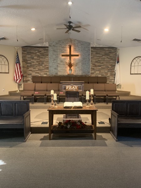 Inside the sanctuary of Faith Baptist Church, close view of pulpit area